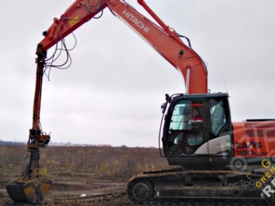 Аренда гусеничного экскаватора с грейфером 12 метров